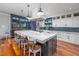 Spacious kitchen with a large island, breakfast bar, and premium appliances at 4412 Pamlico Dr, Raleigh, NC 27609