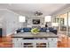 Open concept living room with stone fireplace and sliding doors at 4412 Pamlico Dr, Raleigh, NC 27609