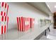 Features snack and drink bar with red and white containers at 4412 Pamlico Dr, Raleigh, NC 27609