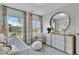 Charming Bedroom with modern dresser, plush toys, two large windows, and neutral color palette at 5032 Jowetts Walk Dr # 26, Cary, NC 27519