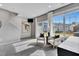 Cozy living room with plush seating, a modern design, and abundant natural light from large windows at 5032 Jowetts Walk Dr # 26, Cary, NC 27519