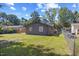 Spacious backyard with well-maintained lawn and privacy fence, perfect for outdoor enjoyment at 506 W Walnut St, Selma, NC 27576