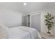 Bright bedroom with closet space, new paint, and light flooring at 506 W Walnut St, Selma, NC 27576