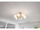 Elegant, modern ceiling light fixture with round glass shades at 506 W Walnut St, Selma, NC 27576