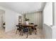 Cozy dining room with wood table, black chairs, patterned rug, and decorative accent wall at 506 W Walnut St, Selma, NC 27576