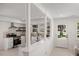Open kitchen featuring stainless steel appliances, granite countertops, and plenty of natural light at 506 W Walnut St, Selma, NC 27576