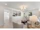 Spacious living room with neutral decor, ample natural light, and an open concept layout at 506 W Walnut St, Selma, NC 27576