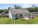 Large backyard featuring a patio, fire pit, and plenty of green space at 509 Par Dr, Nashville, NC 27856