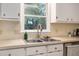 Bright kitchen features a stainless steel sink, window with a view, and ample counter space at 5320 Middleton Rd, Durham, NC 27713