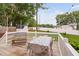 Relaxing outdoor deck with furniture, perfect for enjoying the backyard and outdoor gatherings at 5400 Kaplan Dr, Raleigh, NC 27606