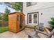 Charming backyard with a wooden sauna, patio and outdoor seating area at 5400 Kaplan Dr, Raleigh, NC 27606