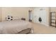 Bedroom with carpet, closet, and bed at 605 Bellefont Ct, Knightdale, NC 27545