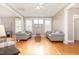 Spacious living room featuring hardwood floors and ample seating at 605 Bellefont Ct, Knightdale, NC 27545
