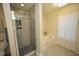 Modern bathroom with a glass-enclosed shower and a separate soaking tub at 6229 Saybrooke Dr, Raleigh, NC 27604