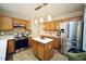 Beautiful kitchen featuring stainless steel appliances, countertops, and center island at 6229 Saybrooke Dr, Raleigh, NC 27604