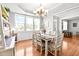 Inviting dining area filled with natural light and access to a cozy living room at 626 Toledo Ct, Rolesville, NC 27571