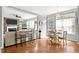 Open-concept living space with a fireplace, living room, and a dining area at 626 Toledo Ct, Rolesville, NC 27571