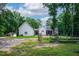 Spacious backyard showing exterior home features and well-maintained landscaping at 698 Maple Springs Ln, Bear Creek, NC 27207
