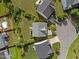 Bird's-eye view of a well-maintained home with lush green lawn and backyard patio at 7 Faircroft Ct, Durham, NC 27703