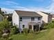 Aerial view of home highlighting the roof, screened porch, and surrounding landscape at 7 Faircroft Ct, Durham, NC 27703