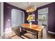 Cozy dining room featuring hardwood floors and a decorative chandelier at 7 Faircroft Ct, Durham, NC 27703