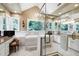 Bright bathroom with a soaking tub under a window and a glass shower at 7620 Rainwater Rd, Raleigh, NC 27615