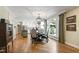 Charming dining room with hardwood floors and views of the landscaped patio at 7620 Rainwater Rd, Raleigh, NC 27615