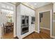 Stainless steel appliances and white cabinets give an updated look to this traditional kitchen at 7620 Rainwater Rd, Raleigh, NC 27615