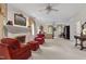 Open-concept main bedroom with fireplace, sitting area, and four-poster bed with plenty of space at 7620 Rainwater Rd, Raleigh, NC 27615
