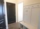 Mudroom with built-in storage and coat hooks at 776 Shadetree Rd, Benson, NC 27504