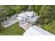 A full outdoor patio and upper deck make for a stunning entertainment space on this property at 7920 E Washington St, Mebane, NC 27302