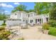 Charming backyard featuring a pergola-covered patio and a pavilion, perfect for entertaining guests and enjoying the outdoors at 7920 E Washington St, Mebane, NC 27302