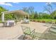 Spacious outdoor pavilion with seating, ideal for hosting events and enjoying the beautifully landscaped surroundings at 7920 E Washington St, Mebane, NC 27302