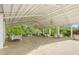 Expansive pavilion featuring chandeliers and seating, set in a picturesque landscape at 7920 E Washington St, Mebane, NC 27302