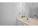 Bathroom featuring a sink with neutral countertops and white cabinets at 8 Summertime Ct, Durham, NC 27707