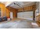 Spacious garage with ample storage space and a large door at 8 Summertime Ct, Durham, NC 27707