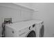 Bright laundry room featuring an LG washer and dryer at 8 Summertime Ct, Durham, NC 27707