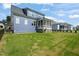 Beautiful home featuring a large backyard, privacy fence, and screened porch, perfect for relaxing and entertaining at 815 Laurelwood Dr, Durham, NC 27705