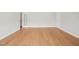 Spacious living room featuring wood floors and neutral walls at 815 Laurelwood Dr, Durham, NC 27705