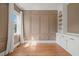 Office space featuring built-in shelves, decorative moulding and natural light at 815 Laurelwood Dr, Durham, NC 27705