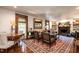 Elegant living room with hardwood floors, fireplace, and refined furnishings, perfect for entertaining and relaxation at 815 Marlowe Rd # 10, Raleigh, NC 27609