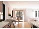 Elegant dining area with table and chairs, bright lighting, and seamless transition to living space at 1017 N Buchanan Blvd # C, Durham, NC 27701