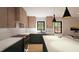 Bright kitchen with modern appliances, stylish cabinets, a large island, and ample counter space for cooking at 1017 N Buchanan Blvd # C, Durham, NC 27701