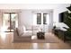Inviting living room with comfortable seating, natural light, and access to outdoor patio for relaxation at 1017 N Buchanan Blvd # C, Durham, NC 27701