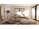 Serene main bedroom with a plush bed, soft lighting, and access to natural light for relaxation at 1017 N Buchanan Blvd # C, Durham, NC 27701