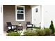 Inviting front porch with comfortable seating perfect for relaxing outdoors at 1025 Quindell Dr, Holly Springs, NC 27540
