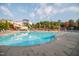 Large community pool area with a slide, lounge chairs, and plenty of space for relaxation and recreation at 10513 Cardington Ln, Raleigh, NC 27614