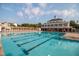 Large community pool area with plenty of lounge chairs perfect for relaxation and recreation at 10513 Cardington Ln, Raleigh, NC 27614