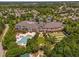 Community clubhouse featuring a pool, green space, and ample parking at 112 Sabiston Ct, Cary, NC 27519