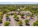Community clubhouse featuring ample parking, landscaping, and a view of the surrounding neighborhood at 112 Sabiston Ct, Cary, NC 27519